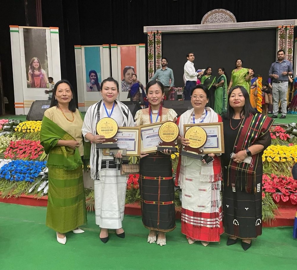 The three Naga women achievers along with Social Welfare department officials at the North East Festival, 2022 at Agartala on May 2. (DIPR Photo)